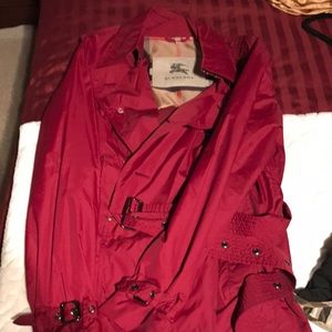 Maroon/Burgundy Burberry Rain Coat.